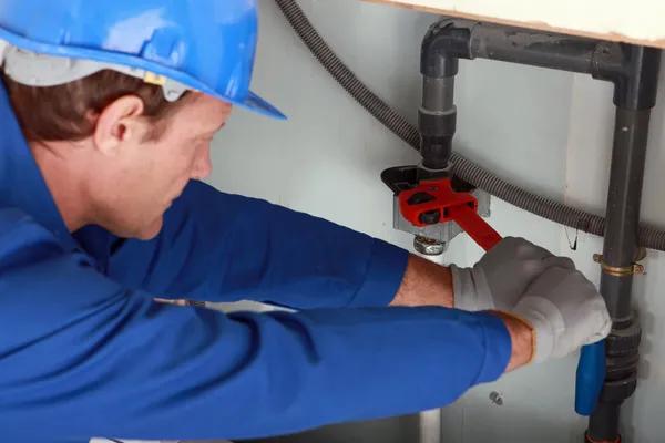 Trusted Plumbers Installing Central Air Conditioning Units